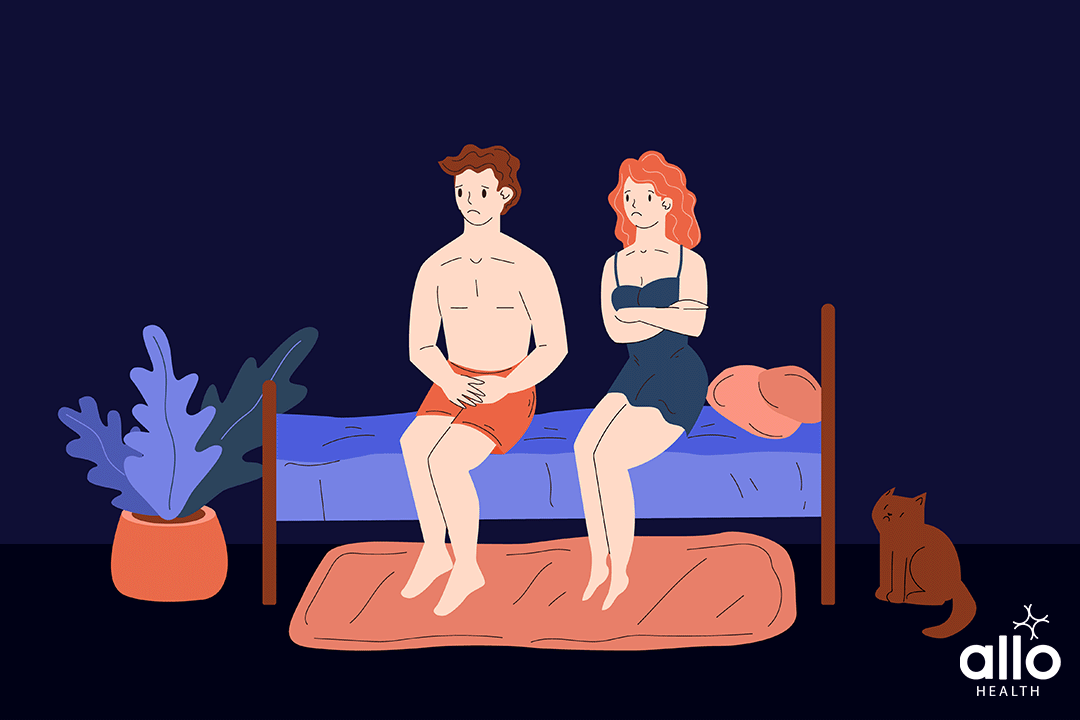 unhappy male and female sitting on bed due to Anejaculation